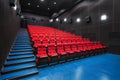 Russia, Nizhny Novgorod - may 23, 2014: Mir Cinema. Empty red cinema hall seats, comfortable and soft chairs