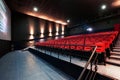 Russia, Nizhny Novgorod - may 26, 2014: Sormovsky Cinema. Empty red cinema hall seats, comfortable and soft chairs Royalty Free Stock Photo