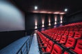 Russia, Nizhny Novgorod - may 26, 2014: Sormovsky Cinema. Empty red cinema hall seats, comfortable and soft chairs Royalty Free Stock Photo