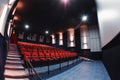 Russia, Nizhny Novgorod - may 26, 2014: Sormovsky Cinema. Empty red cinema hall seats, comfortable and soft chairs Royalty Free Stock Photo