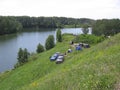 camping in a park for cars parking in a tourist camp on the shore people relax