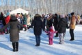 cheerful people parents and children hold hands on a traditional Russian holiday dancing in a