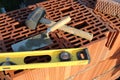 Russia, construction tools for working on the walls of a house with bricks with a hammer and a spatula