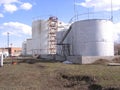 Large storage tanks for industrial fuel at the factory for aviation kerosene reserves in tanks