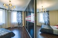 Russia, Novosibirsk - 07 May, 2016: interior room apartment. decorative elements, large beautiful bed in the bedroom, chandelier