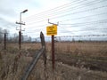 metal mesh fence prohibits access to the secret territory sign with the inscription