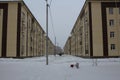 passage for pedestrians sidewalk in winter between houses alley in the city for walking