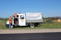 road workers men in a special car for repair