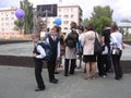 Russia, Novosibirsk, September 1, 2012: a large crowd of parents and first-graders near the school came to classes with students