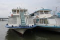 Russia, steamers at the pier boats with stern for tourists walking on the river