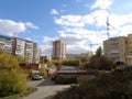 urban development industrial city with roofs of houses and cars