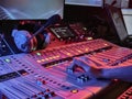 russia october 2020. Close-up of hand's sound engineer working on music mixer in the recording studio. low light color