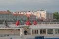 Russia, old St. Petersburg. People in the city, people on a boat, tourists in red blankets, the Neva River, a bright summer day, s