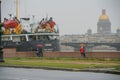 Russia, old St. Petersburg. People in the city, rain, people with umbrellas, port, pier ships, sights, urban landscape