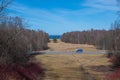 Russia, Peterhof, early spring View of the Gulf of Finland. Blue sky, sunny landscape, road, blue car.