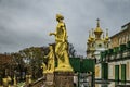 Russia, Peterhof - November 3, 2023: Golden statues on the fountains of the Lower Park