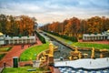 Russia, Peterhof - November 3, 2023: Turned off fountains with golden statues in the Lower Park in autumn
