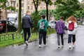 Russia Petersburg August 4, 2020: a group of teenagers strolling through the city in the summer-a view from the back.