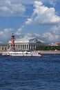 Russia, Petersburg, June 8, 2019. Spit of Vasilyevsky Island. Pictured is the Rostral Column and the Stock Exchange building on Royalty Free Stock Photo