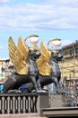 Russia, Petersburg, June 29, 2019. Winged lions on the Bank Bridge. Griffins on the Bank Bridge on the Fontanka River, according