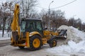 Russia 07.02.2020 Republic Of Bashkortostan.. Clearing snow in Russia. Grader clears the way after a heavy snowfall. Tractor