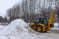 Russia 07.02.2020 Republic Of Bashkortostan.. Clearing snow in Russia. Grader clears the way after a heavy snowfall. Tractor