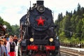 Russia, Republic of Karelia, Ruskeala - August 10, 2023: Arrival of a retro train at the station