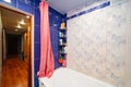 bathroom interior with blue ceramic tiles on the walls.