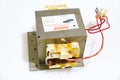 High-voltage transformer for Samsung microwave oven on a white background.