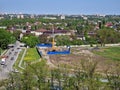 Russia, Rostov-on-Don - July, 17, 2023: Construction and traffic of the metropolis, against the background of houses and a road