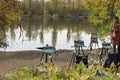 RUSSIA, ROSTOV-ON-DON - October 11, 2020: easel with painter works near picturesque autumn lake