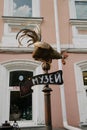 08.21.2021, Russia, Ryazan. A sculpture of a rooster with a pointer at the Museum of the History of Ryazan Lollipop on Cathedral