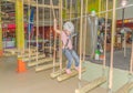 Russia, Saint-Petersburg, adventure Park, adventure Gornostay 27 Oct 2017 girl on the obstacle course wearing a helmet and Royalty Free Stock Photo
