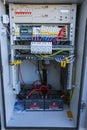 Russia, Saint-Petersburg - April 30, 2018: Inside part of climatic vandal-proof cabinet with microwave equipment and power cables