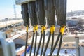 Russia, Saint-Petersburg - April 30, 2018: Protective covers of optic cables connected to telecommunication radio panel antenna