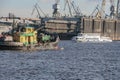 Russia, Saint Petersburg, bright sunny spring day Neva River industrial ship, industrial transport