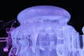 A Large ice jellyfish lying on a pedestal