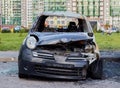 Russia. Saint Petersburg. July 17, 2019. Partially burned car after a fire, parts of the body burnt door handles and cracked glass