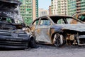 Russia. Saint Petersburg. July 17, 2019. Partially burned car after a fire, parts of the body burnt door handles and cracked glass