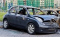 Russia. Saint Petersburg. July 17, 2019. Partially burned car after a fire, parts of the body burnt door handles and cracked glass