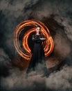RUSSIA, SAINT PETERSBURG - OCTOBER 10, 2022: Girl performing fire dance