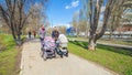 Two young mothers with prams Royalty Free Stock Photo