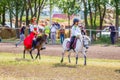 Samara, August 2018: Children in Russian national costumes sit on a pony Royalty Free Stock Photo