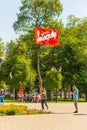 Samara, August, 2018: A pensioner goes to a protest rally. Text in Russian: Strike