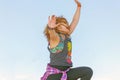 A portrait of a girl dancing a Brazilian samba dance on the embankment of the Volga River