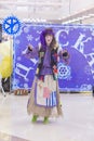 Festival Plasticine rain. Girl-mime in a fantastic costume