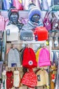 Shelves with knitted hats in a sports store