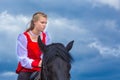 Cossack performs stunts on a galloping horse Royalty Free Stock Photo