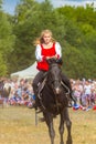 Demonstration of a Cossack girl on a horse for guests and spectators of the festival
