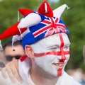 Football English fan with a painted English flag on his face at the World Cup Royalty Free Stock Photo